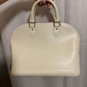 LV epi alma pm bag.